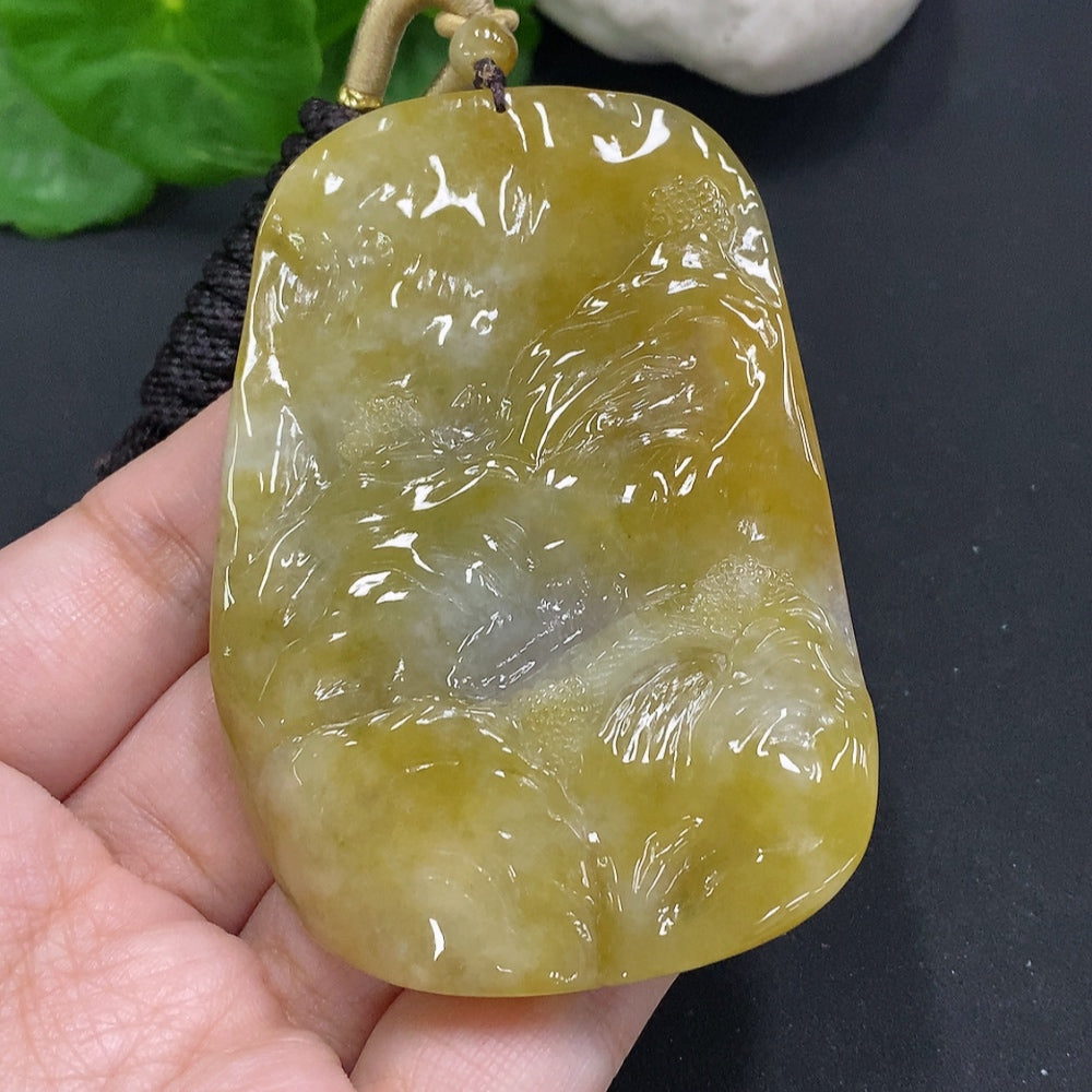 Jadeite Guanyin pendant with landscape carving, attached to rope, weighs approximately 84.3g, crafted by HUILIU HQ.