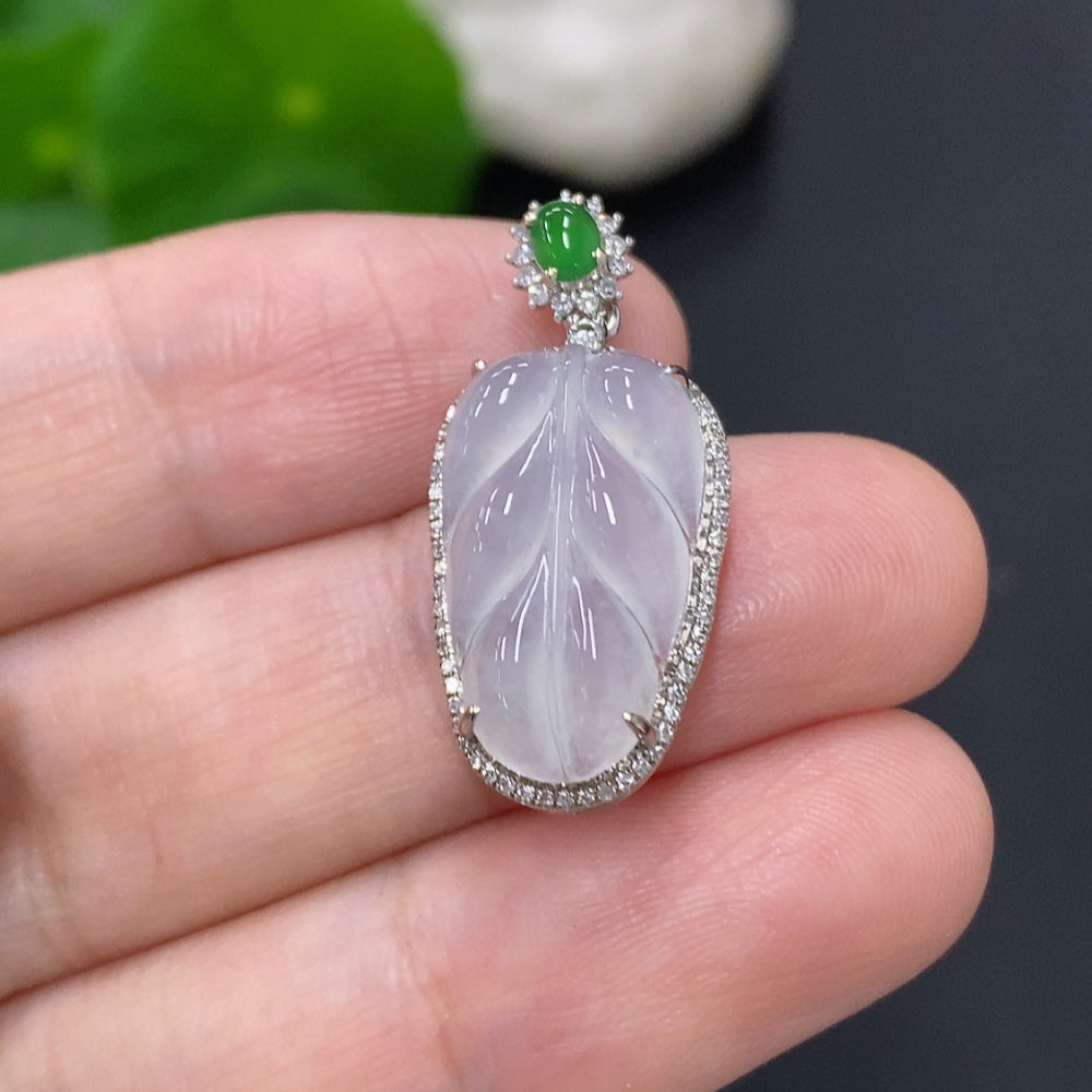 Jadeite leaf pendant in 18K gold with diamond accents, weighing approximately 2.5g, featuring intricate leaf design from HKHQ.