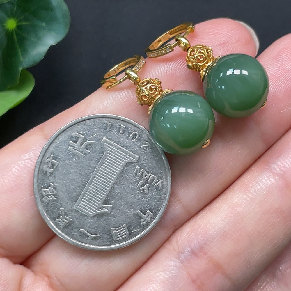 Hetian Jade earrings with 18K gold and diamond accents, measuring 11.6mm, crafted by HKHQ with a total weight of 6.79g.