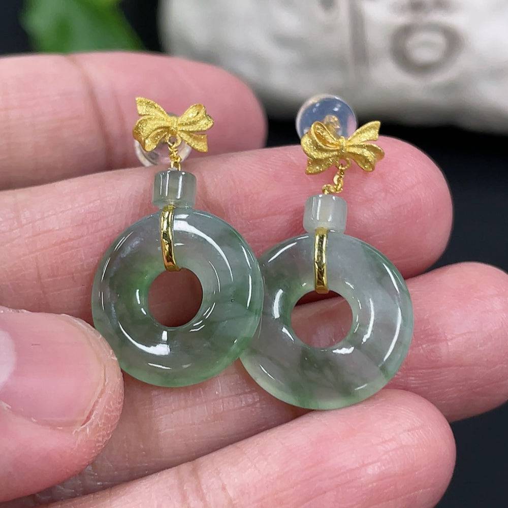 HUILIU HQ Jadeite donut stud earrings in 18k gold setting, with a natural green jade appearance and a lightweight design.