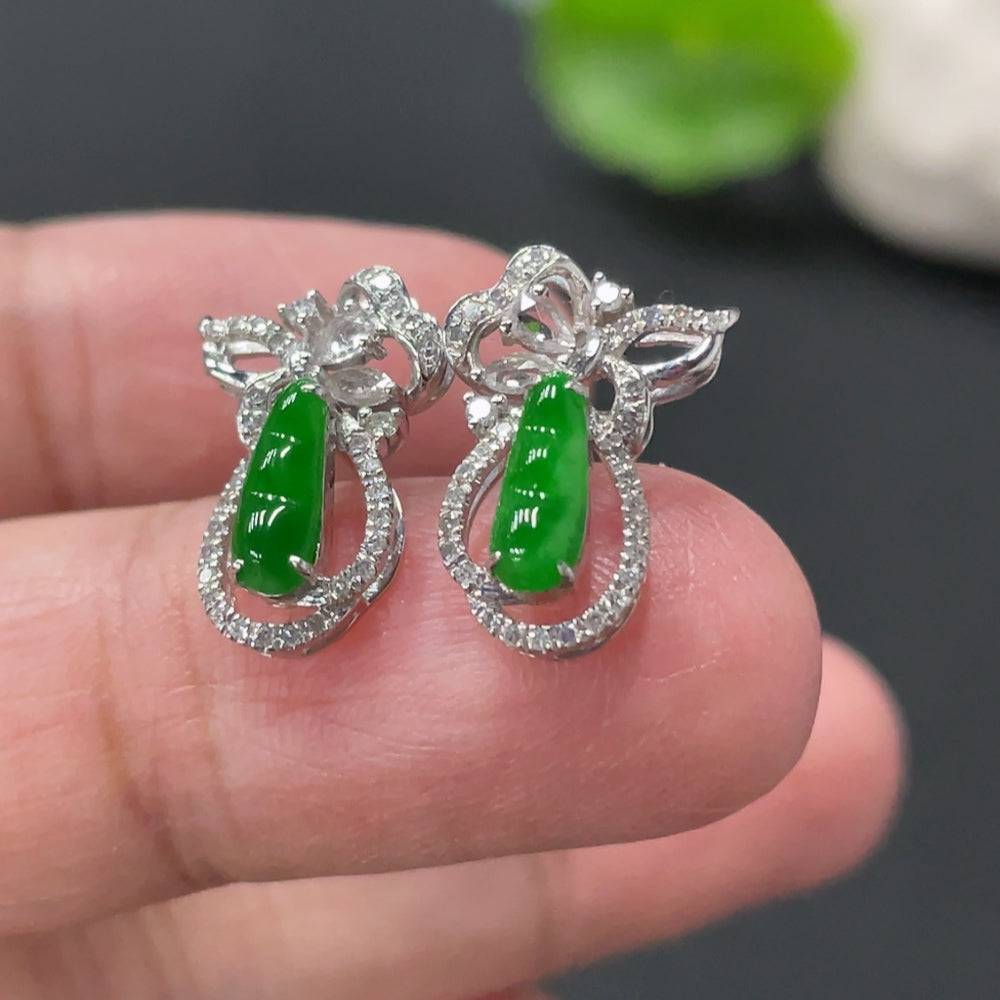 Huiliu Jadeite Lucky Bean earrings pair with diamond accents, featuring small sparkling stones, in a detailed jewelry setting.