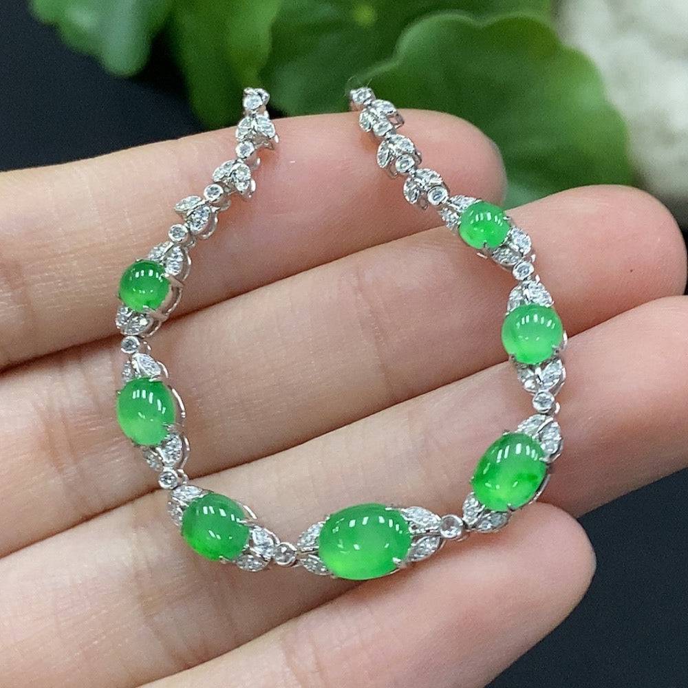 Jadeite inlaid necklace with 18K gold and diamond accents, featuring a delicate jade pendant on a fine gold chain.