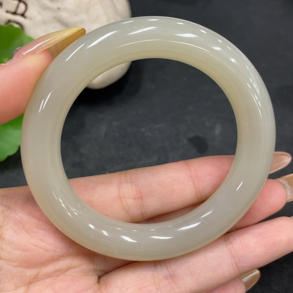 HKHQ Hetian Jade round bangle with size 54.7 and weight 66.8g, showcasing smooth, polished green jade bracelet.