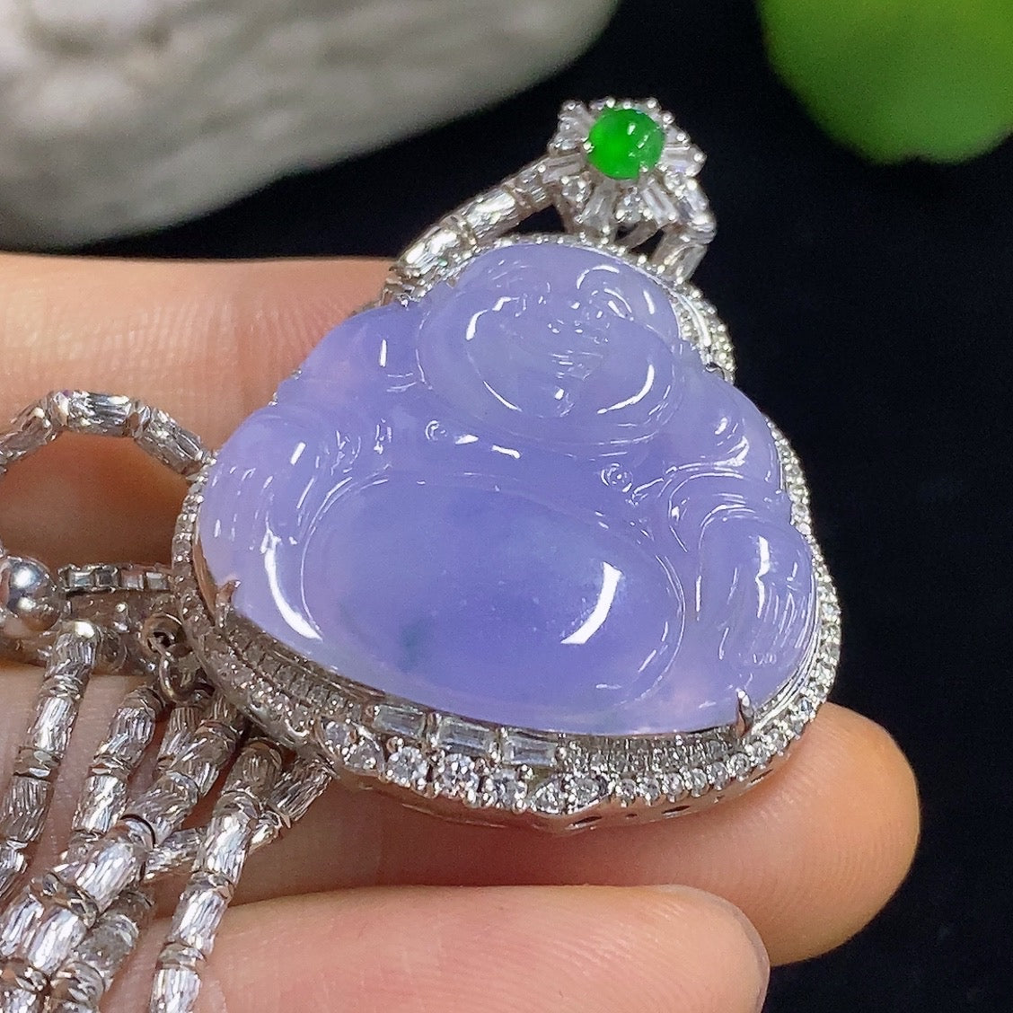 Jadeite Buddha pendant necklace by HKHQ with 18K gold accents and diamond details, showcasing a detailed Buddha figure.