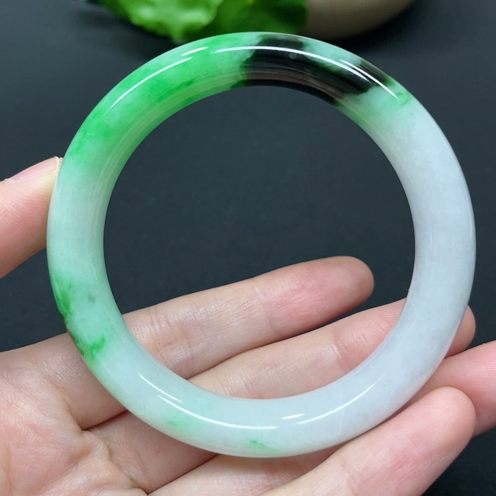 HKHQ jadeite round bangle with size 52.5 and weight 51.35g, showcasing smooth, polished jadeite in a circular bracelet design.
