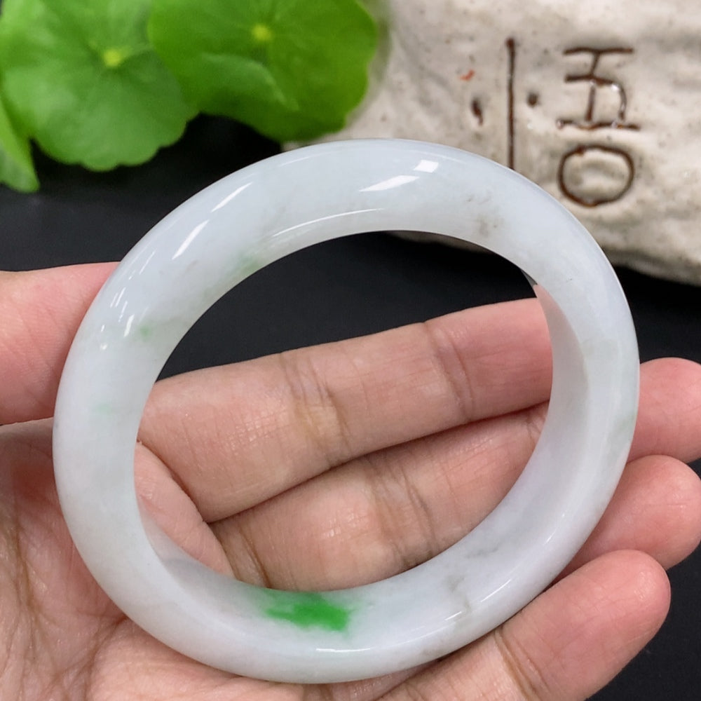 HKHQ Jadeite round bangle bracelet in size 52.7 with a weight of 53.25g, showcasing smooth, polished jadeite jewelry.