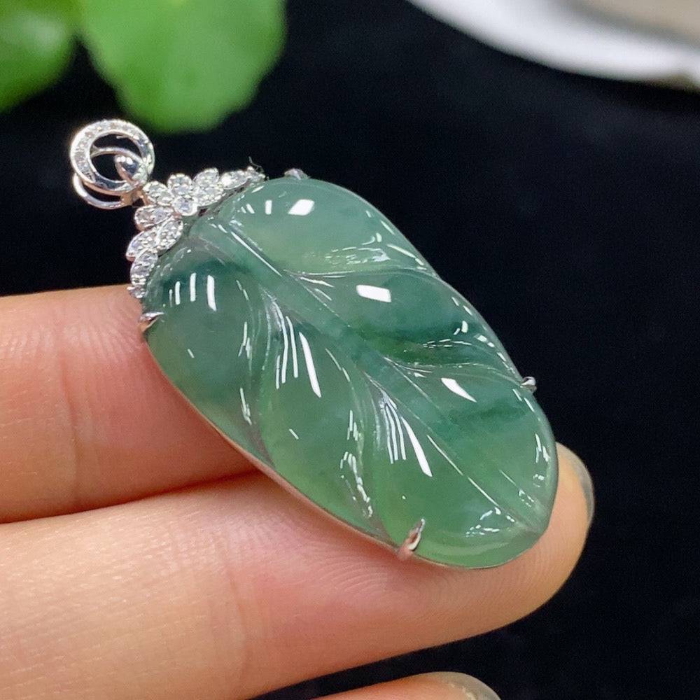 HUILIU HQ jadeite leaf inlaid pendant with 18k gold and diamond accents, featuring detailed jade jewelry craftsmanship.