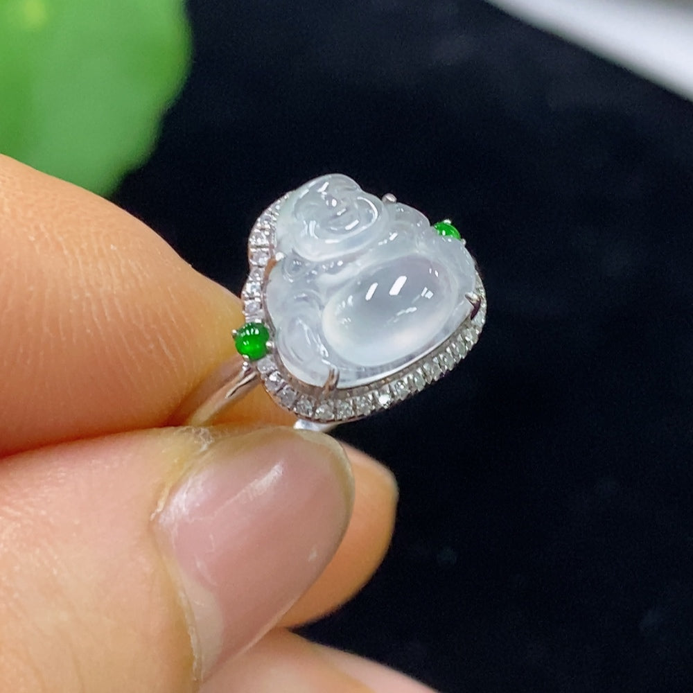Huiliu Jadeite ring set with diamond accents, featuring polished green jade and sparkling diamonds in a fine jewelry setting.