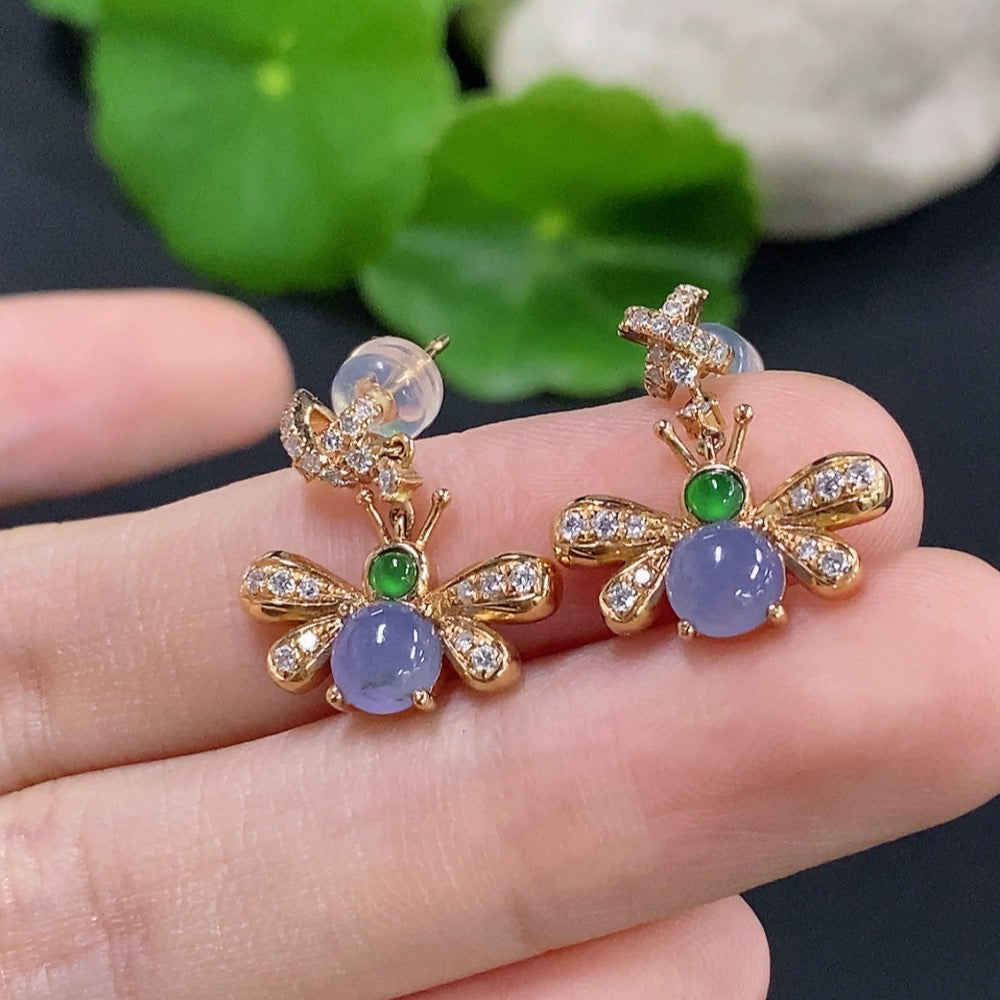 HKHQ jadeite cabochon earrings with 18K gold and diamond accents, showcasing elegant jewelry design.