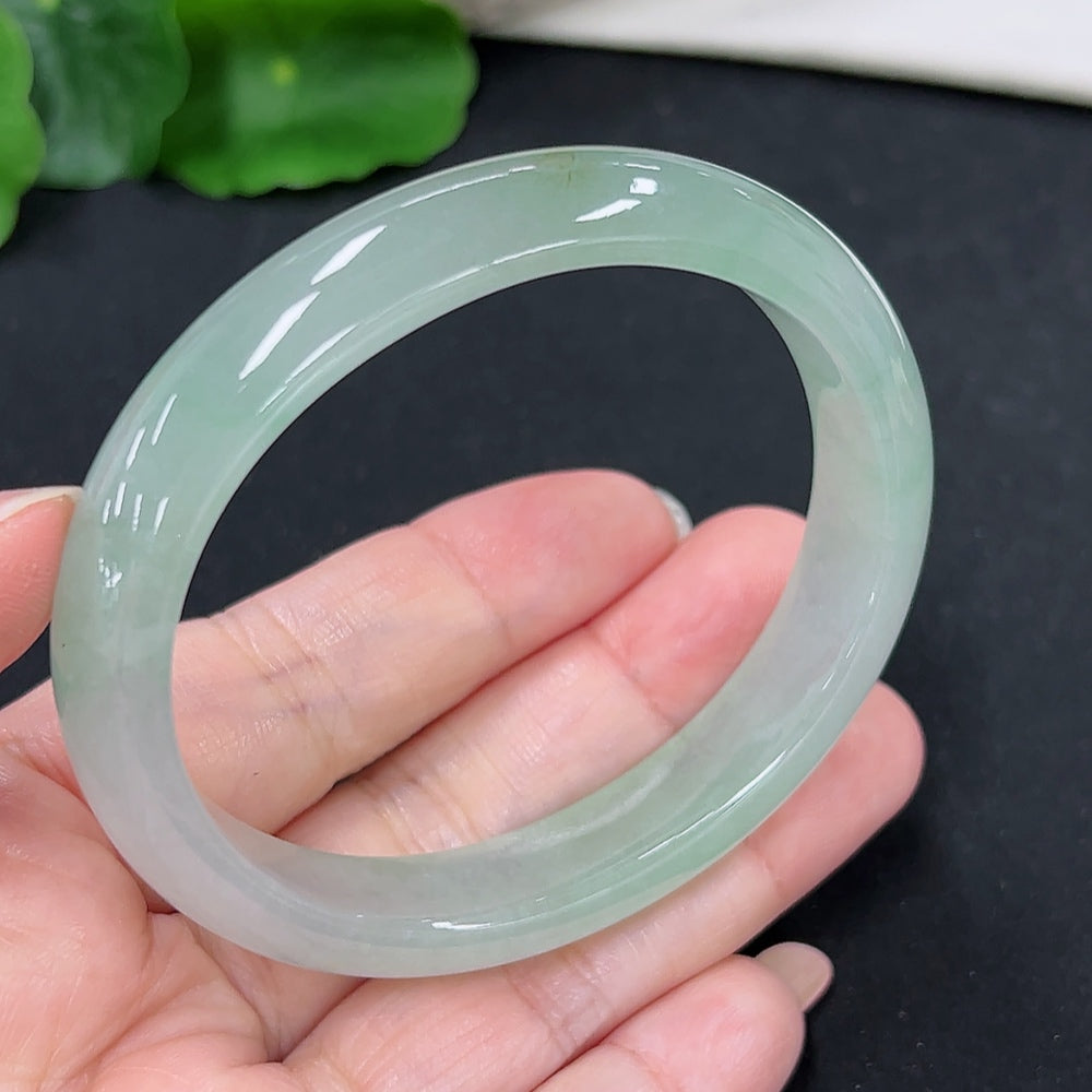 HKHQ jadeite concubine bracelet with carved details, weighing approximately 41.1g, featuring sizes 56.2 and 48.4.