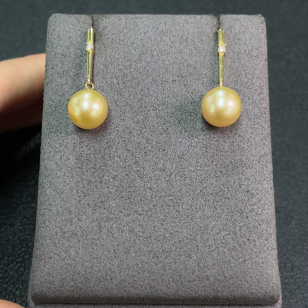 Seawater Pearl Earrings Set in 18K Gold, Approx. 9.2mm, Total Weight About 3.60g, Color Origin Undetermined, Accented with Diamonds