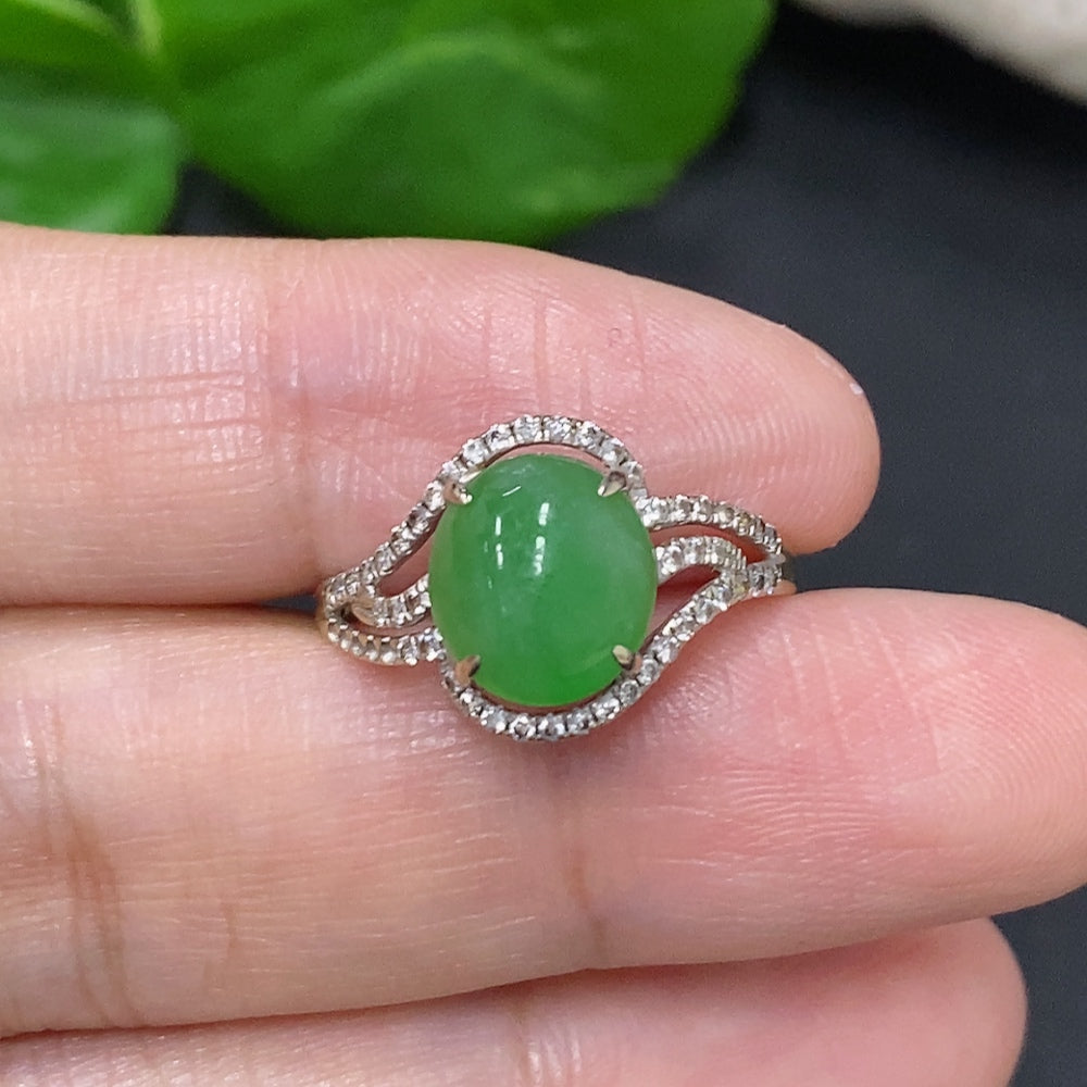 Jadeite cabochon ring with diamond accents in 18K gold, size 15, weighing approximately 2.6g, featuring a polished jade stone.