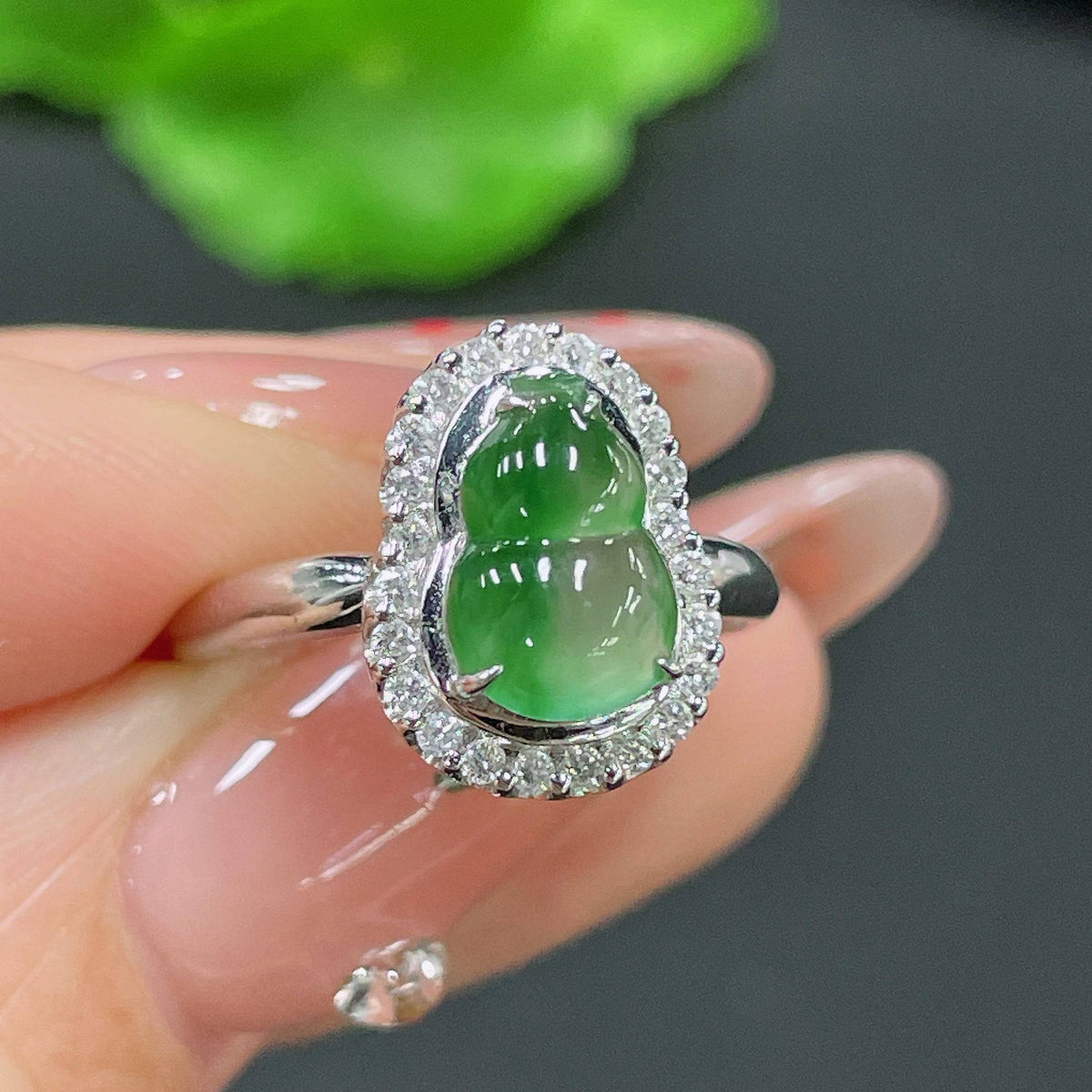 HUILIU HQ jadeite ring setting with a diamond, showcasing intricate craftsmanship and elegant design.