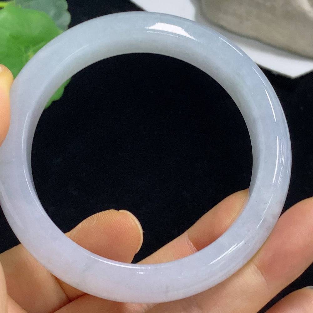 Huiliu certified jadeite round bracelet featuring smooth, polished green jade beads on a delicate elastic cord.