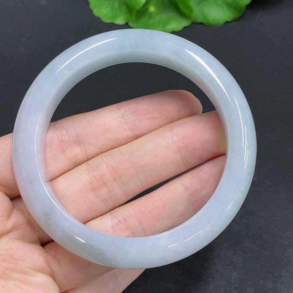 Huiliu certified jadeite round bracelet with smooth, polished green jade beads on a flexible string.