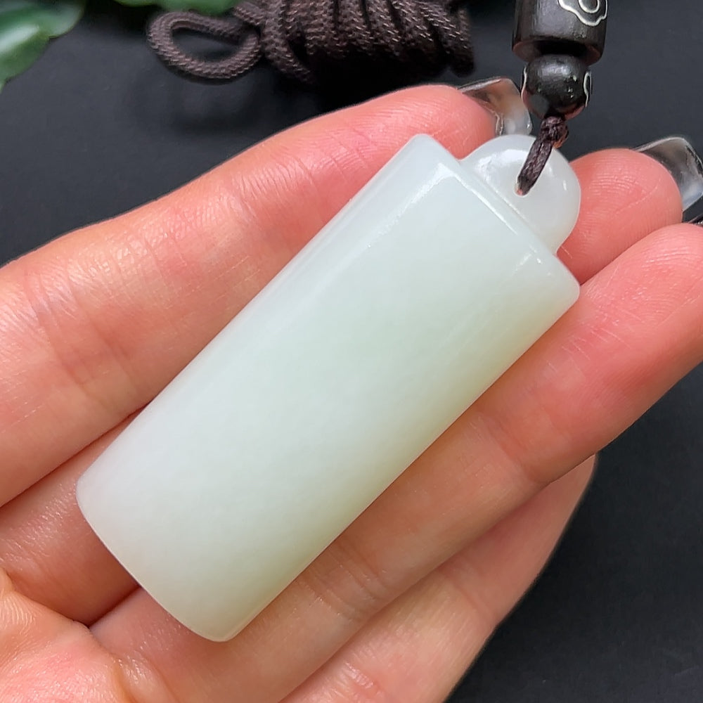 Hetian Jade bamboo tube pendant necklace by HKHQ with rope, weighing approximately 38.6g, featuring a smooth jade pendant.