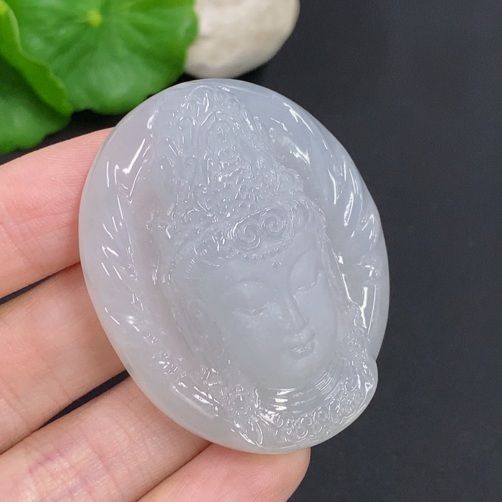 Jadeite Guanyin pendant necklace from HKHQ, featuring a detailed carved figure on a string necklace, weighs approximately 38g.