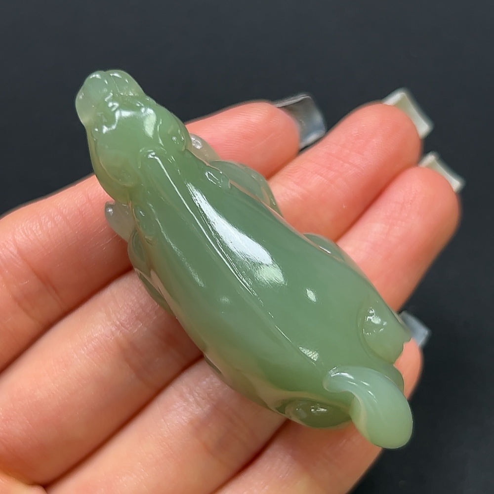 Hetian Jade Pi Xiu pendant from HKHQ, featuring a detailed carved jade design, weighing approximately 40 grams.