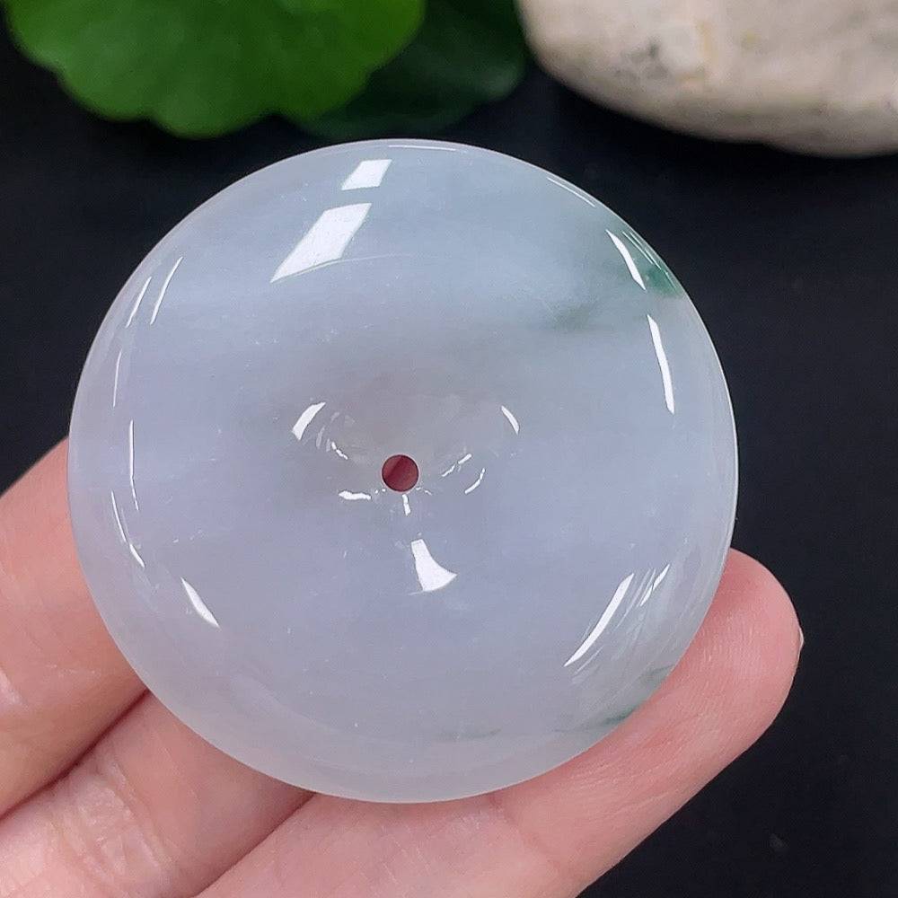 HUILIU HQ jadeite Peace Knot pendant featuring intricate carving and smooth jade surface, certified by Huiliu.