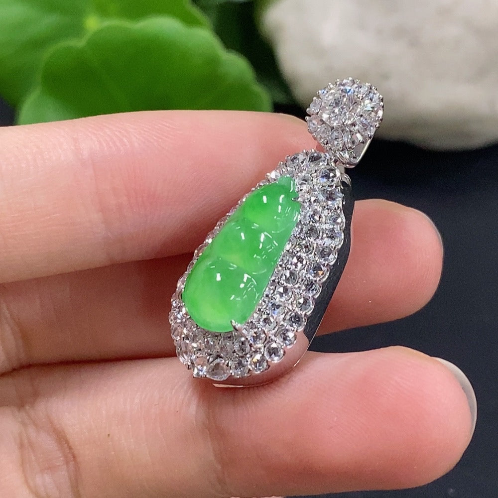 Jadeite lucky bean pendant necklace with 18K gold and diamond accents, featuring a polished green jadeite bead on a delicate chain.