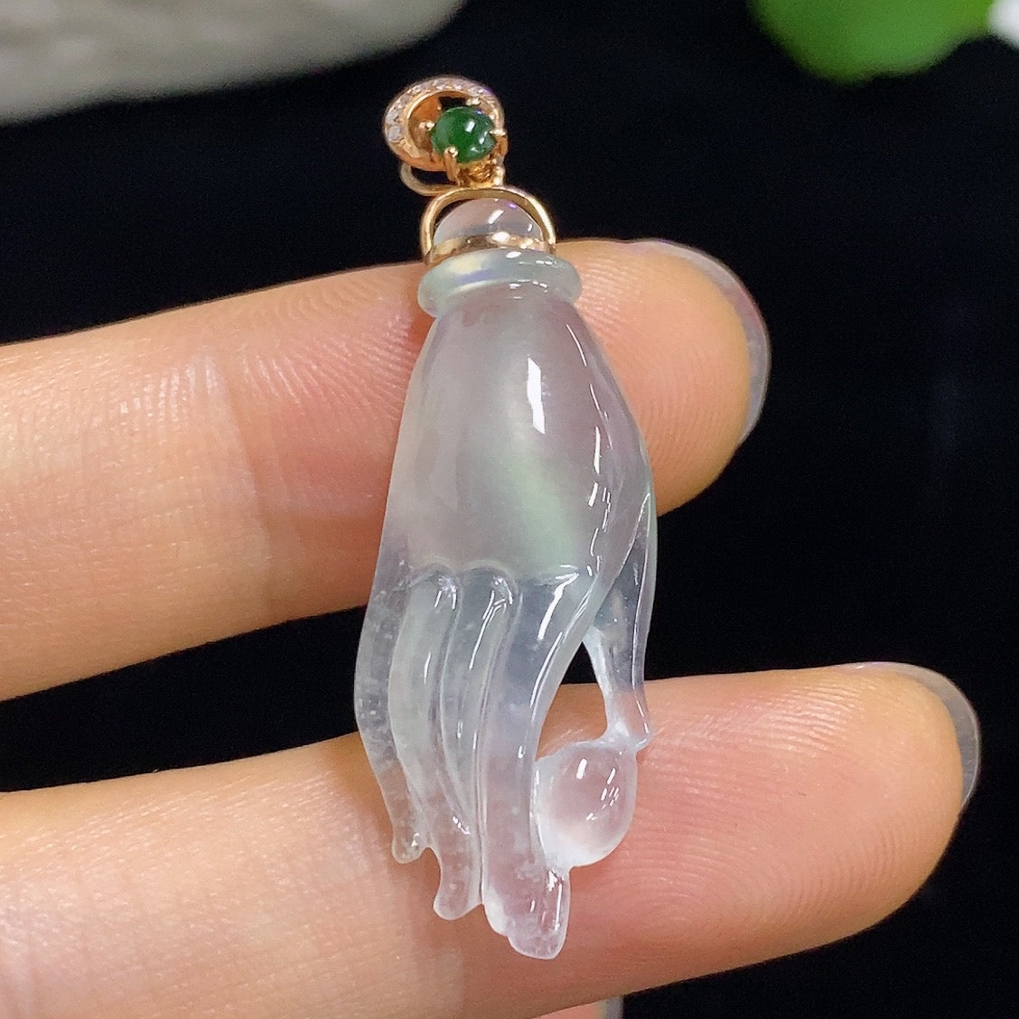 Jadeite pendant with diamond accents in 18k gold, elegant necklace featuring a polished green jadeite stone and sparkling diamonds.