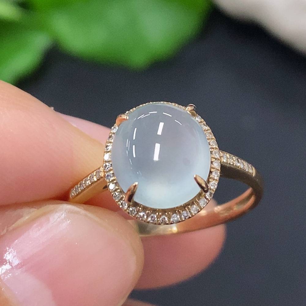 HUILIU HQ jadeite cabochon ring with diamond accents, showcasing a polished green jade gemstone on a delicate band.