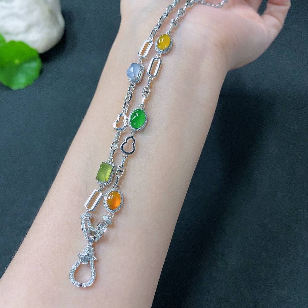 HUILIU HQ jadeite necklace with 18k gold and diamond inlay, featuring a polished jade pendant on a gold chain.