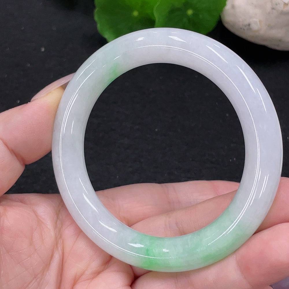 Round jadeite bangle with size 54 and 57.4g weight, crafted by HUILIU HQ, showcasing smooth, polished green jade jewelry.