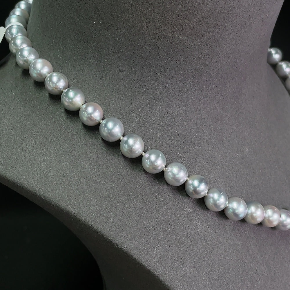Saltwater pearl strand necklace by HKHQ featuring lustrous non-gold pearls on a delicate string.