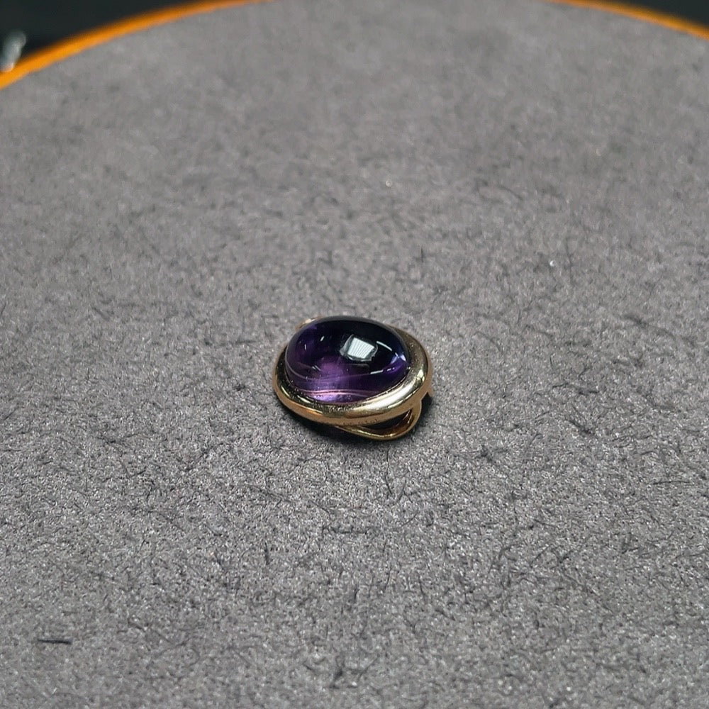 Huiliu Certified gemstone crystal pendant featuring a polished, transparent gemstone hanging from a delicate chain.