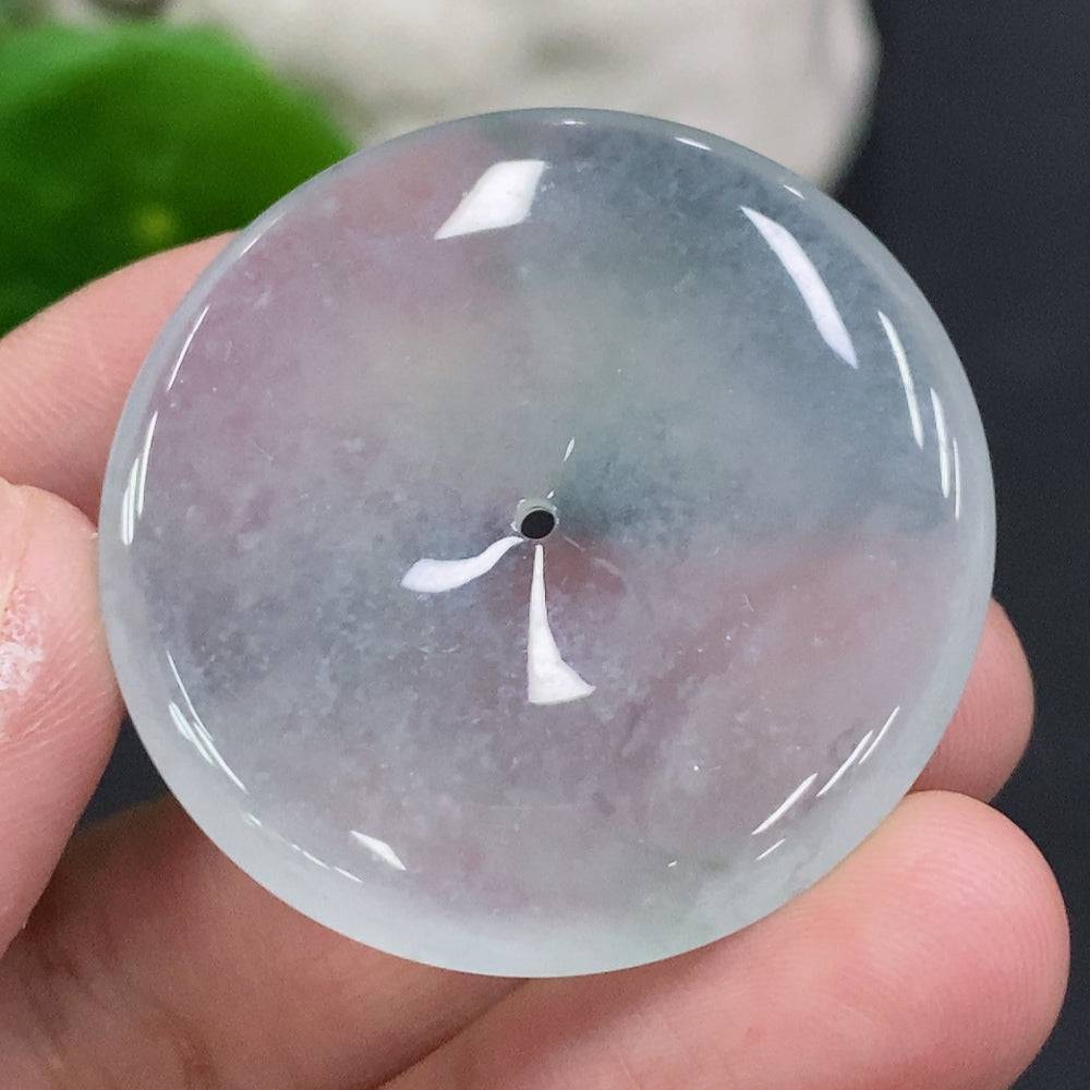 Elegant jadeite peace button from HUILIU HQ, featuring smooth green jade with carved peace symbol for jewelry or accessories.