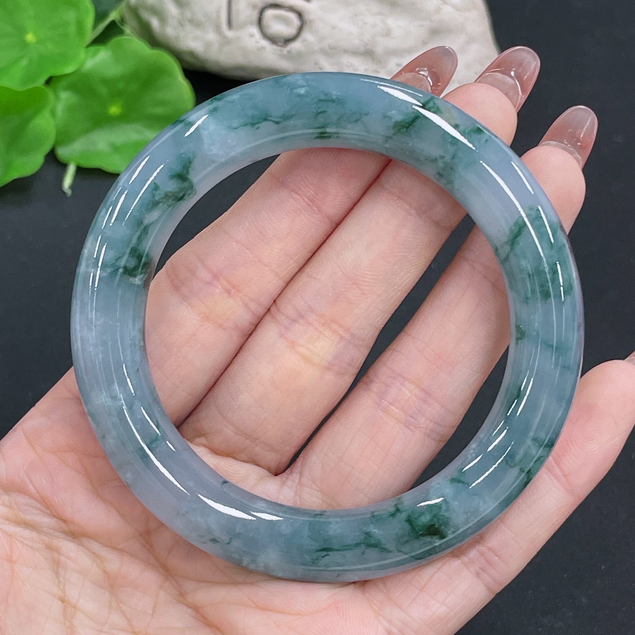 HUILIU HQ jadeite round bangle with a 56.3mm size and 74.57g weight, crafted from smooth, polished jadeite stone.