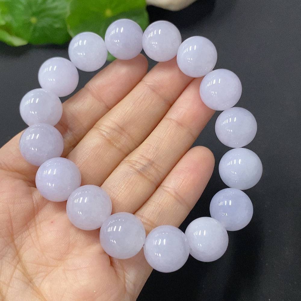 HUILIU HQ jadeite bracelet with 12.8mm beads, approximately 55g, featuring smooth, polished green jade stones.