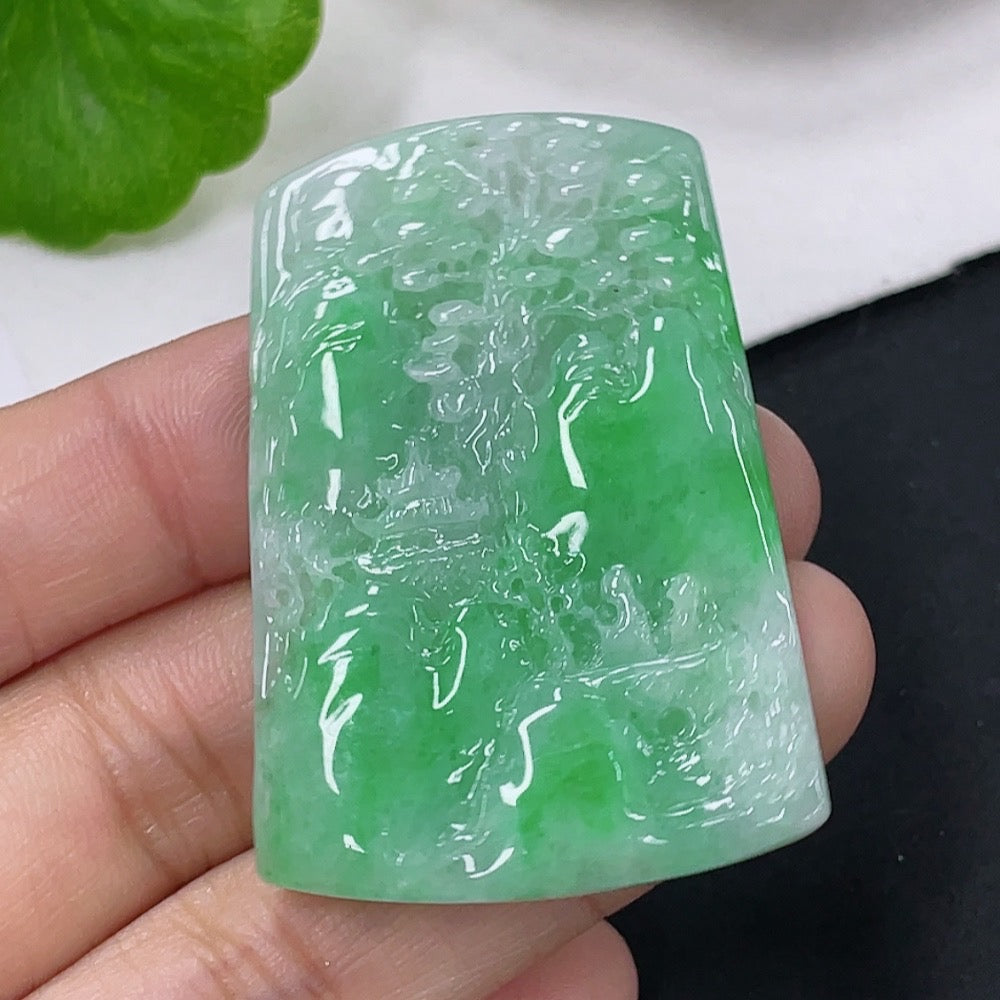 Jadeite pendant featuring a landscape design, crafted by HUILIU HQ, weighing approximately 16.93g, with intricate carved details.