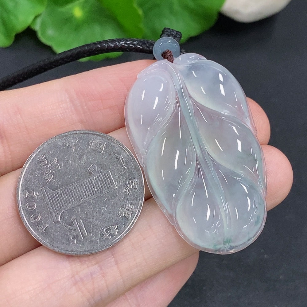 HKHQ jadeite leaf pendant necklace showcasing a detailed green jade leaf design on a delicate chain.