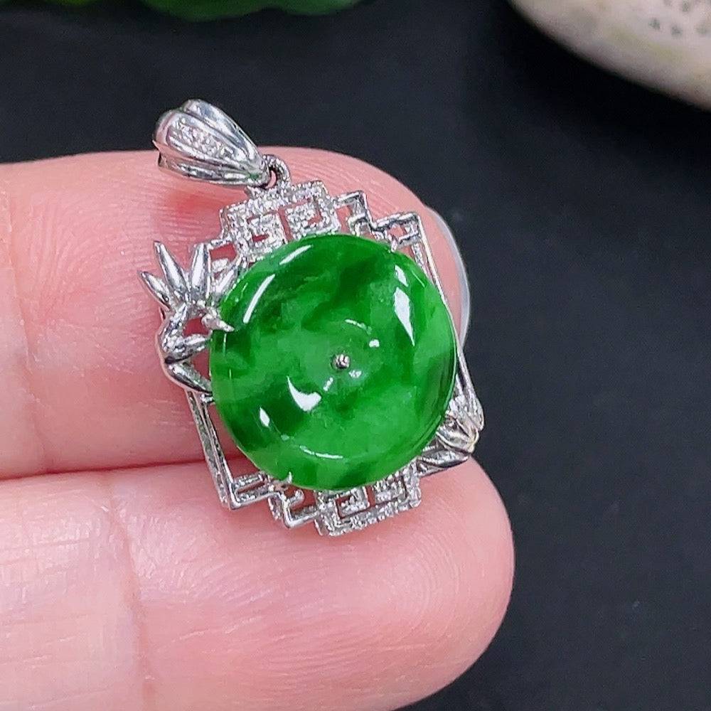 Jadeite inlaid pendant with 18K gold setting, crafted by HUILIU HQ, featuring a smooth, polished jade gemstone design.