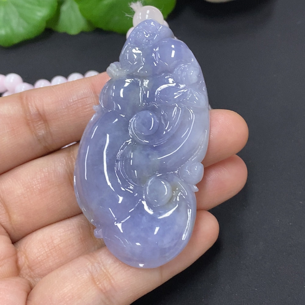 Huiliu Jadeite Ruyi pendant with chain, featuring smooth green jade and intricate carvings, certified by Huiliu HQ.