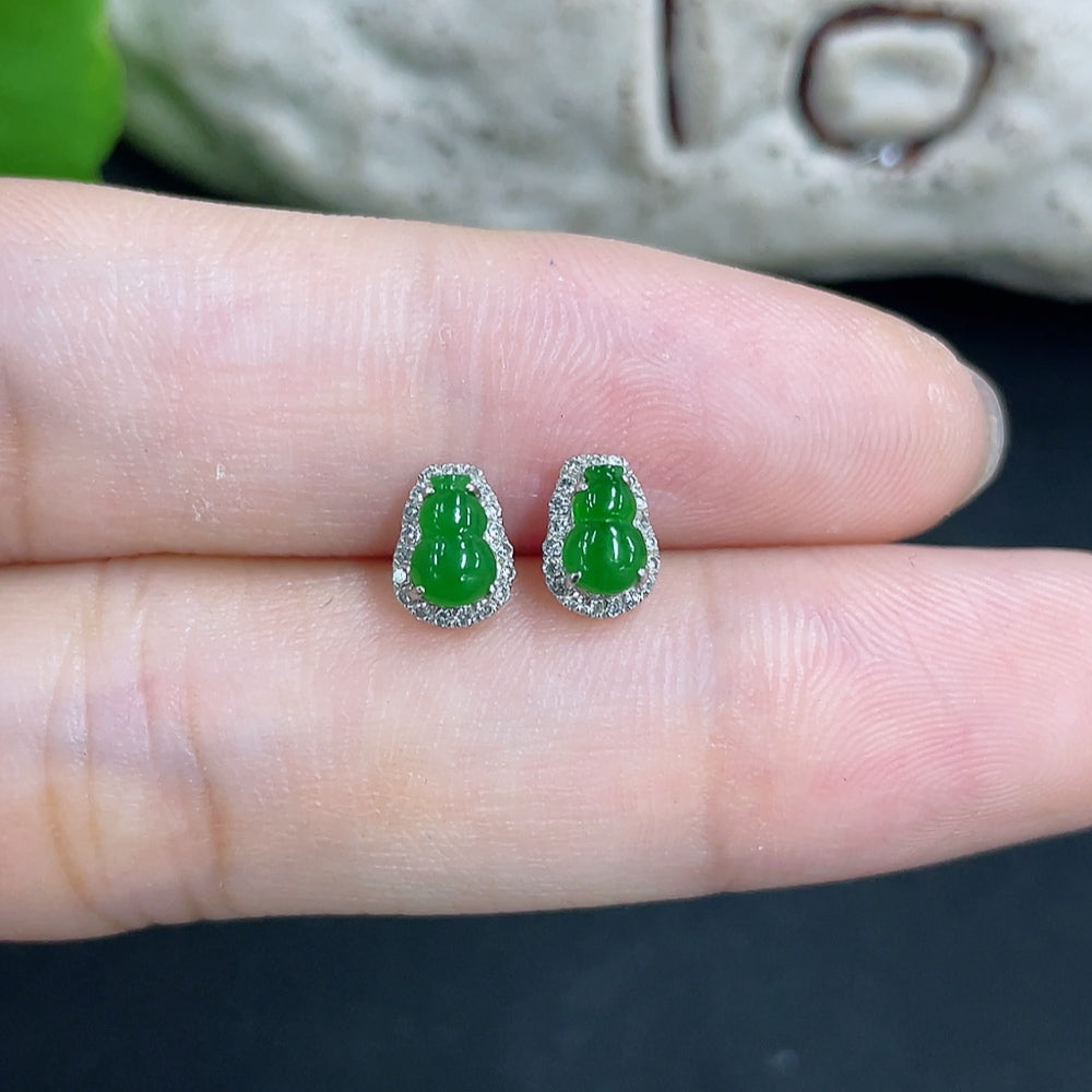 Jadeite earrings with 18k gold and diamond accents, delicate design, showcasing green jade stones and fine craftsmanship.