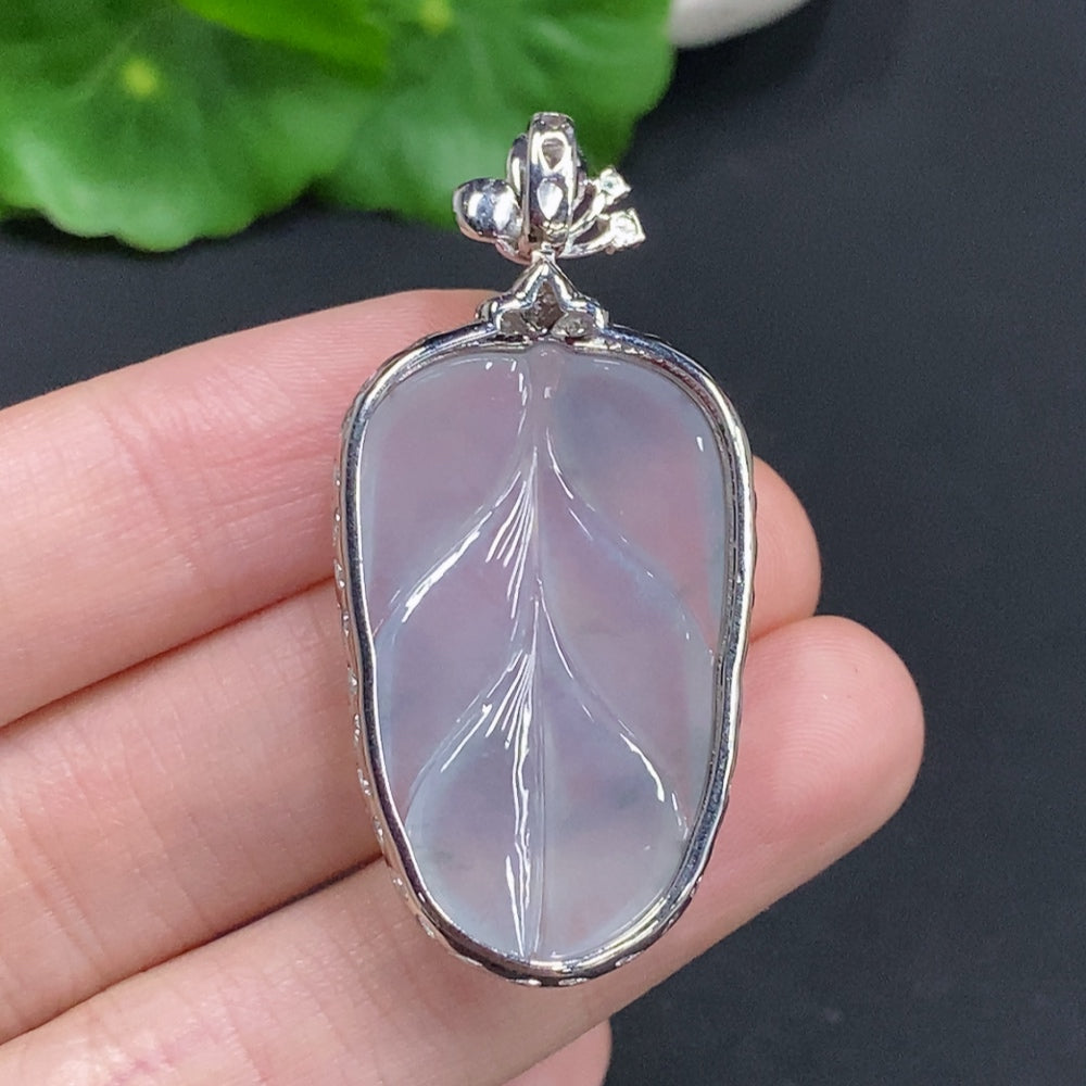 Huiliu Jadeite leaf inlay pendant with diamond accents, crafted from green jade, featuring intricate leaf design and sparkling stones.