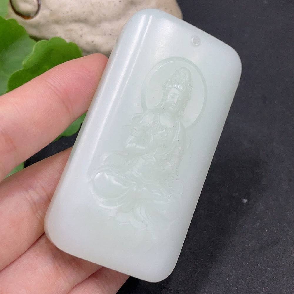 Huiliu Hetian Jade Guanyin pendant with detailed carving, certified jade jewelry, showcasing traditional Asian spiritual art.