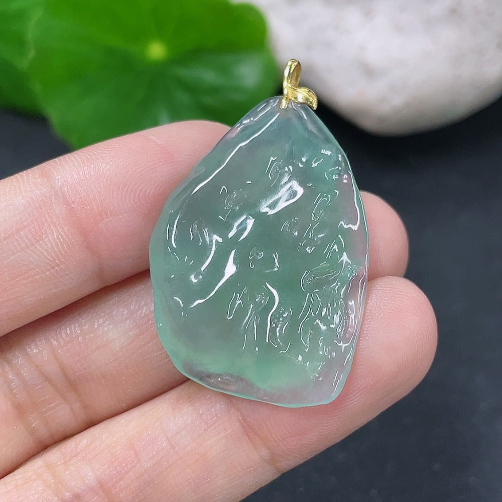 Jadeite pendant with 18k gold setting, weighs approximately 6.34g, featuring smooth, polished green jade stone, crafted by HKHQ.