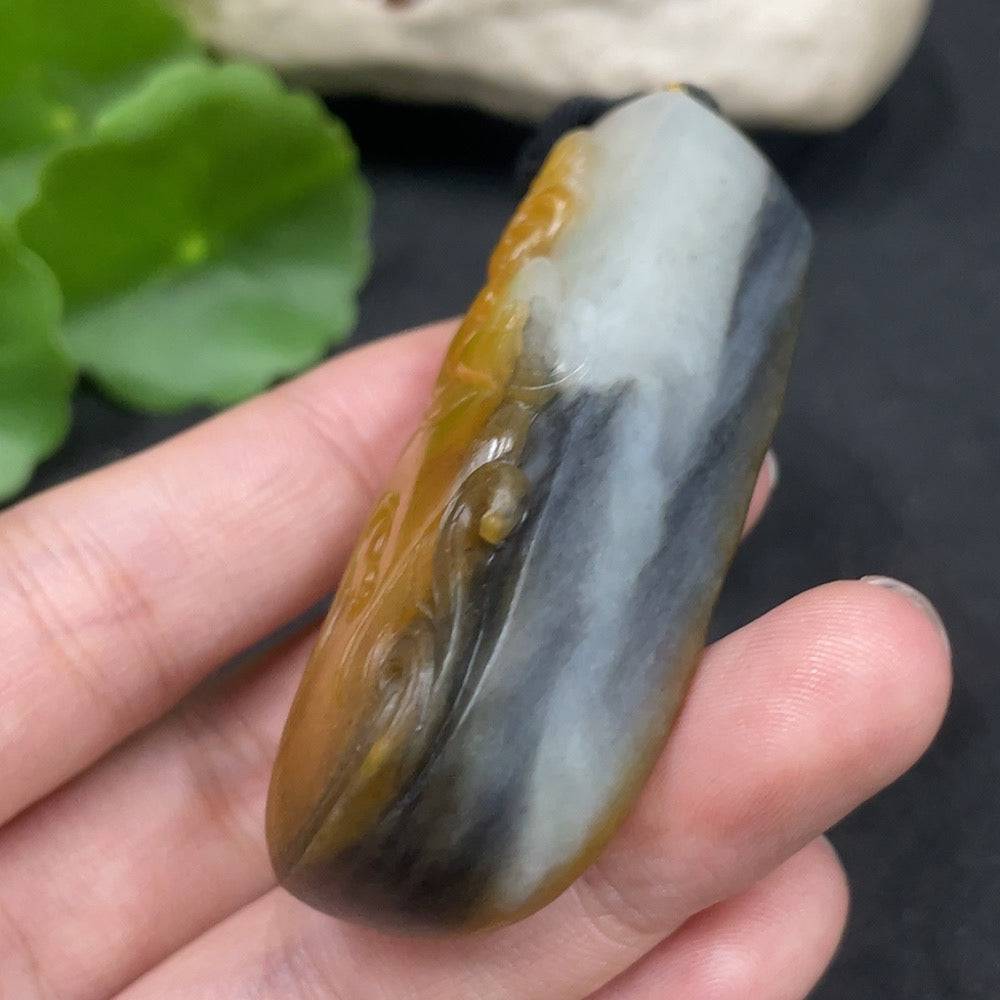 Huiliu certified Hetian jade pendant featuring Guanyin figure, undetermined skin color, mineral components, and a matching jade rope.