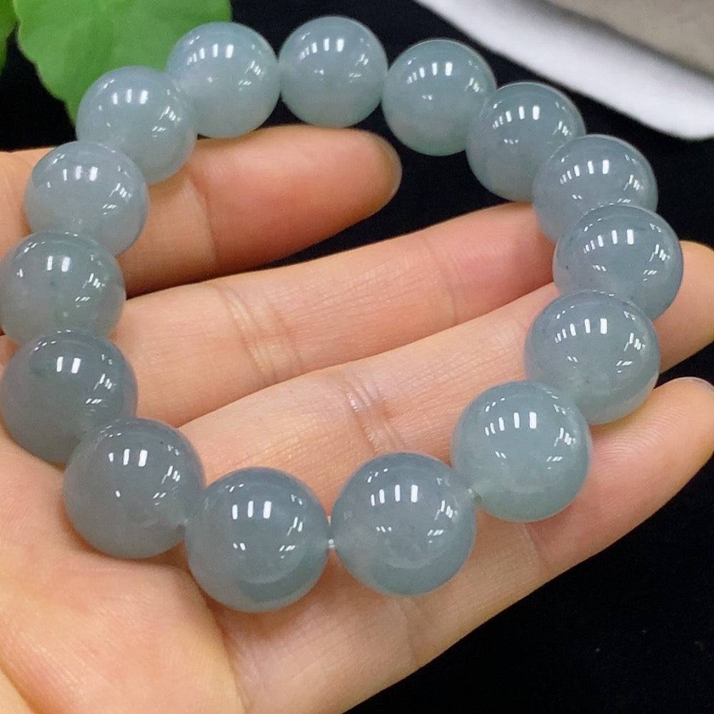 HUILIU HQ jadeite bracelet with 13mm beads, showcasing smooth, polished jade stones and a total weight of 58.13 grams.
