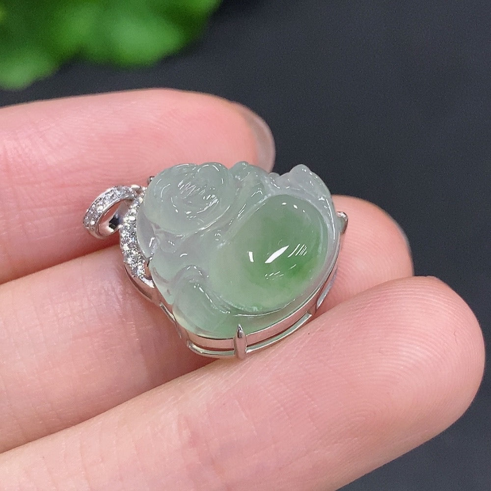 Jadeite Buddha pendant with 18K gold accents and diamond details, featuring a carved jade Buddha figure on a chain.