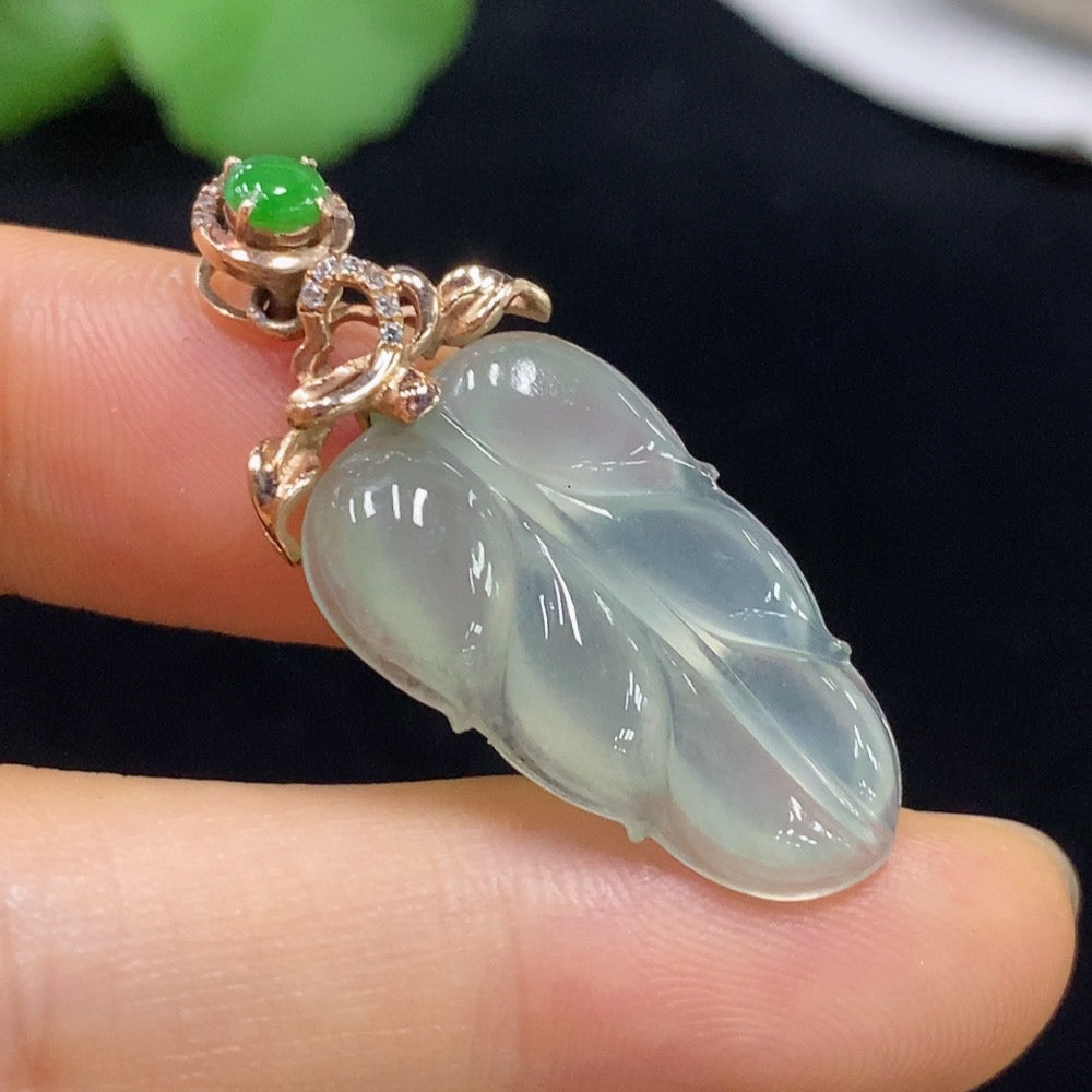 Huiliu Jadeite leaf pendant with 50% AU, non-diamond, Huiliu certified, featuring a detailed jade leaf design.