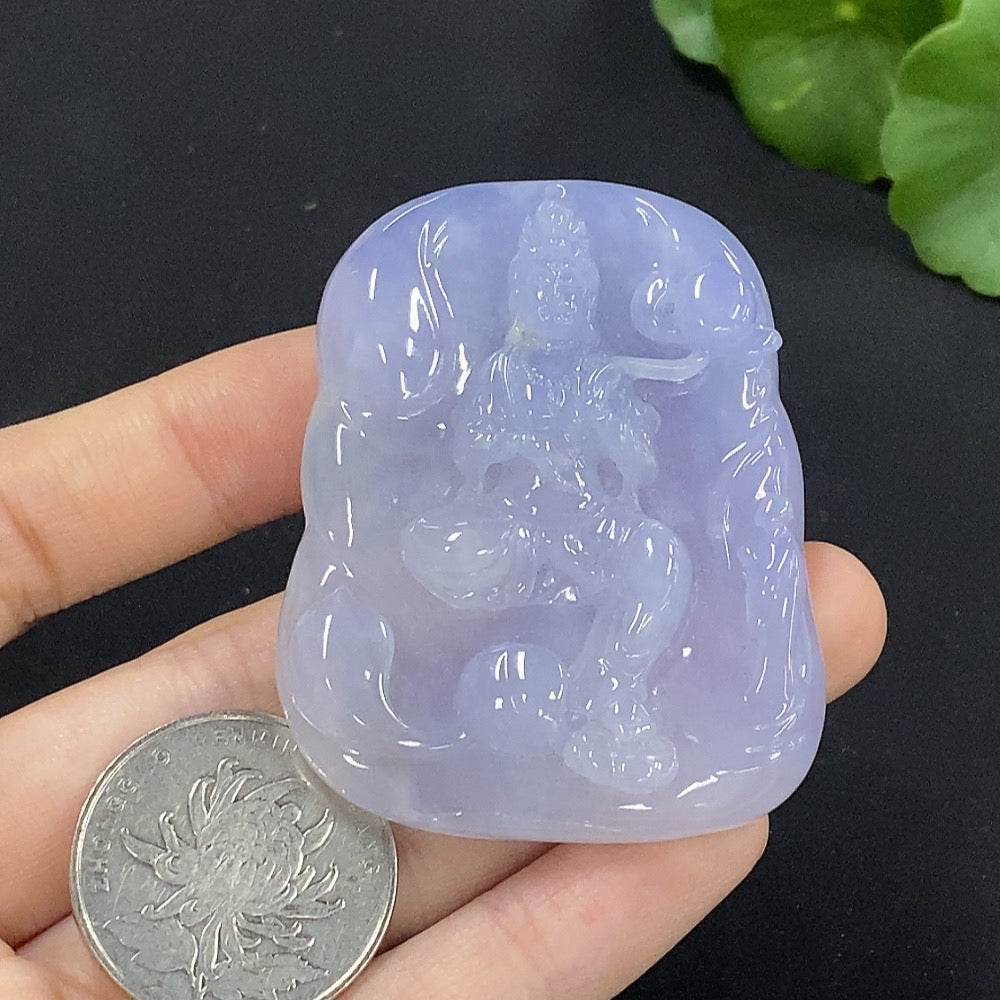 Huiliu Certified Jadeite Guanyin pendant featuring intricate carvings and a smooth jade surface, displayed against a neutral background.
