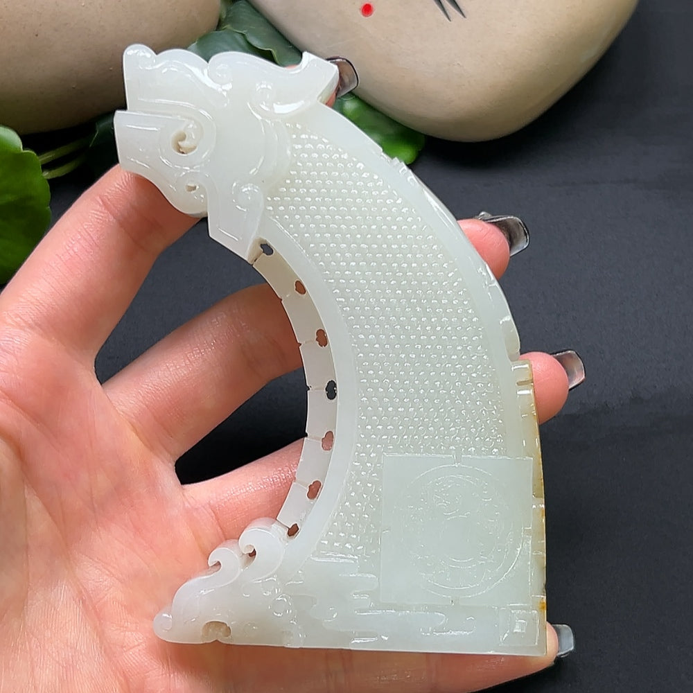 Hetian Jade Chinese Dream Ornament featuring intricate carving and smooth jade surface, crafted by HKHQ.