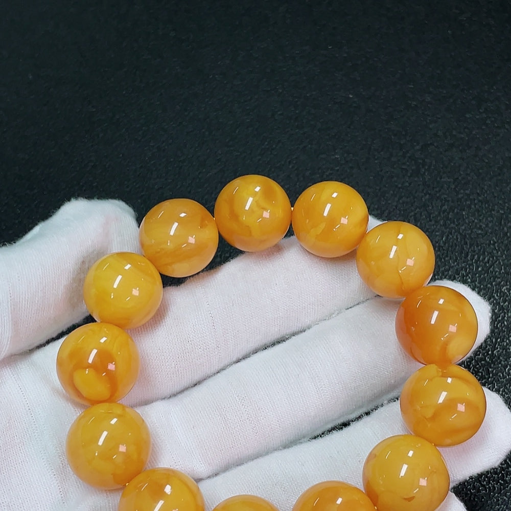 Amber beeswax bracelet, total weight about 31.24g, size about 16mm, color origin undetermined