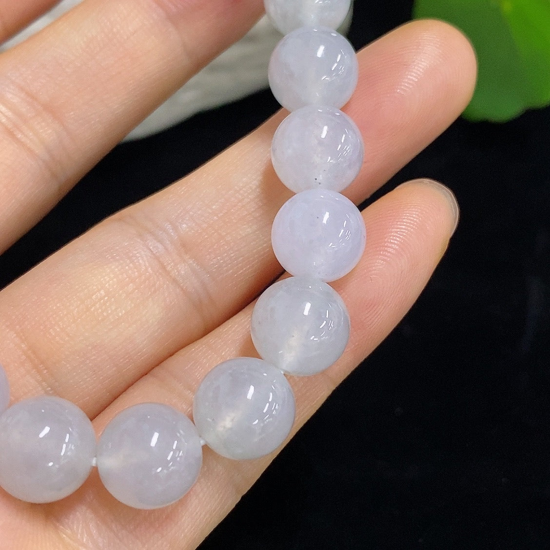 HKHQ jadeite bracelet, 9.6mm wide, featuring smooth, polished green jadeite stones with a total weight of 31.93g.