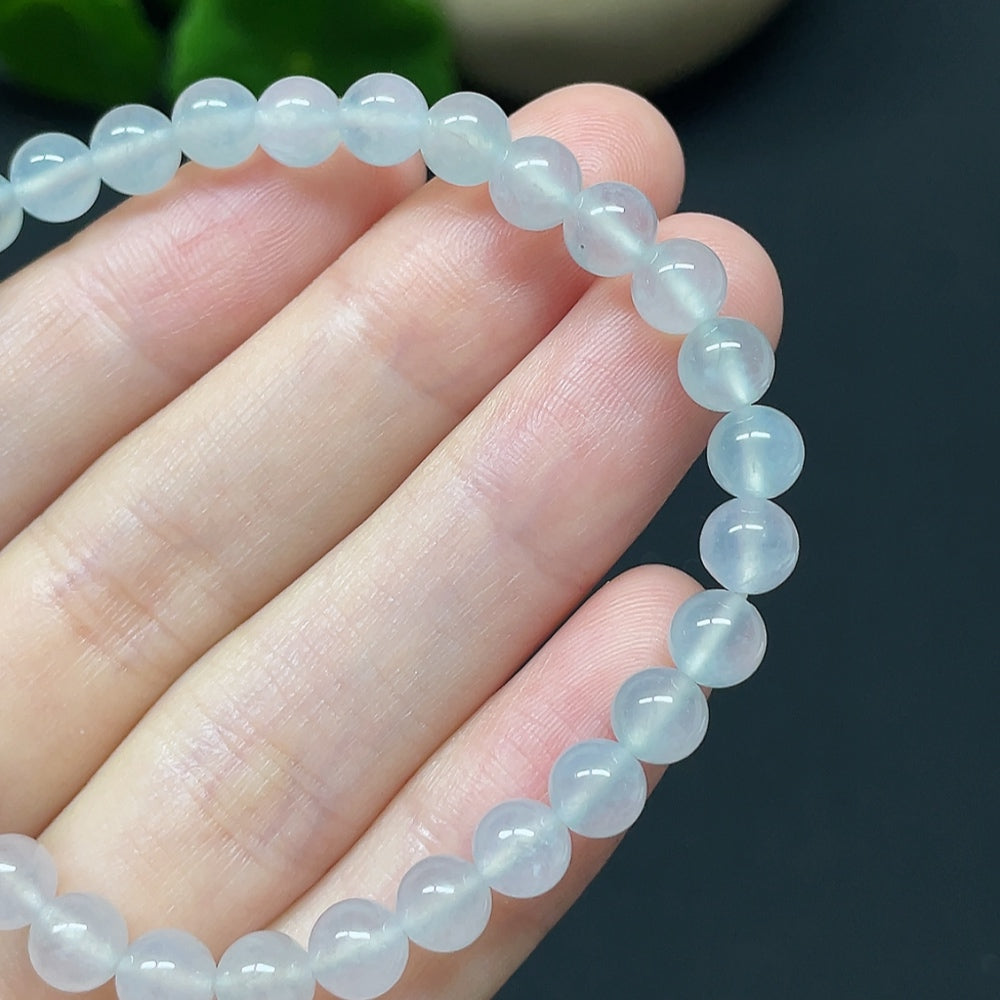 HKHQ jadeite bracelet with non-gold beads, total weight 10.66g and bead size 5.8mm, featuring smooth, polished jade beads.